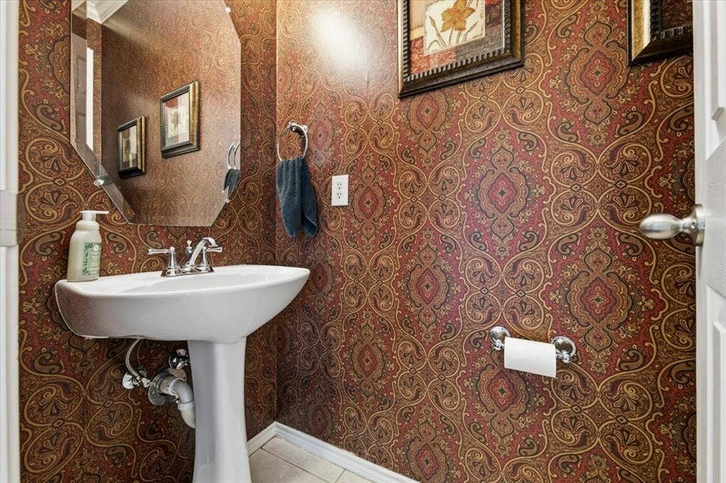 Half Bath between Family room and Primary bedroom