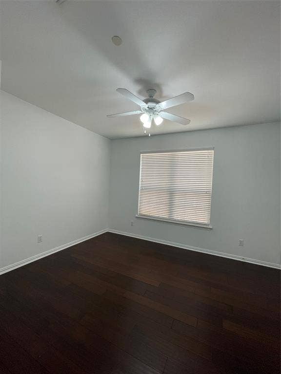 1944 Loma Linda Drive, Irving, TX 75063 Room featuring wood-finish flooring, neutral wall paint, a ceiling fan with integrated light fixture, and a window with horizontal blinds