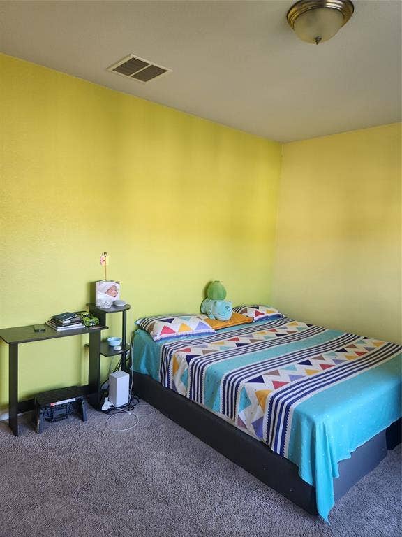 3038 Ivy Hill Lane, Irving, TX 75063 Carpeted flooring, contemporary light fixture, and vibrant wall color