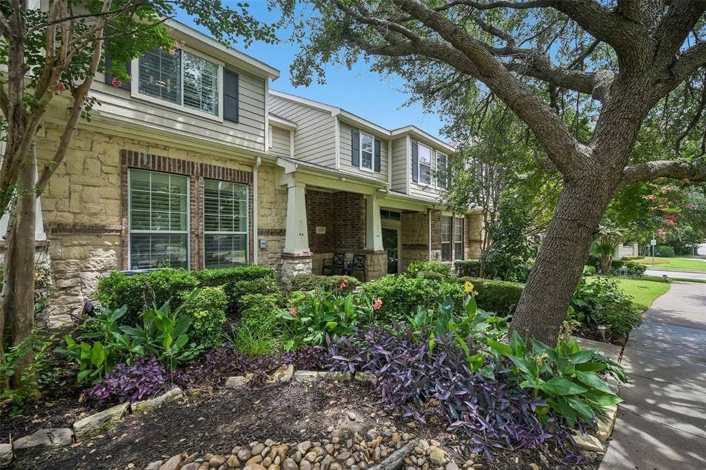 2209 Stonepark Place, McKinney, TX 75071 Stone and siding exterior with a covered porch