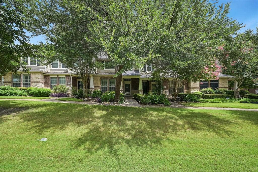 2209 Stonepark Place, McKinney, TX 75071 Brick and siding exterior with mature trees