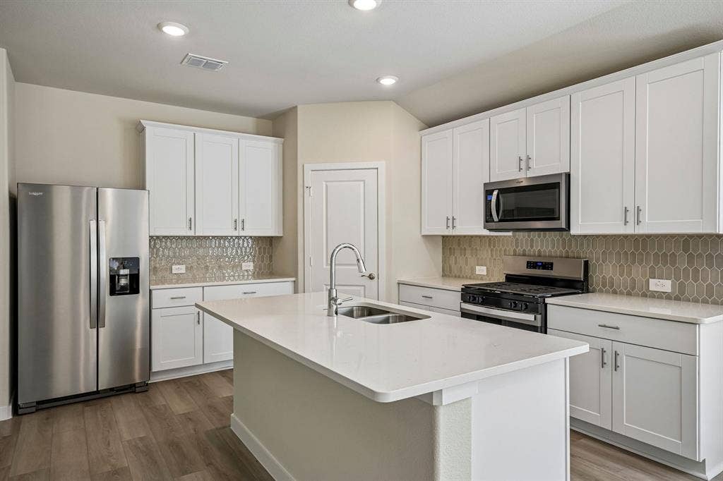 2509 Grand Canyon Street, Anna, TX 75409 Photo is not of the actual home, but is an inspirational photo of builder’s model home and may depict options, furnishings, and/or decorator features that are not included.