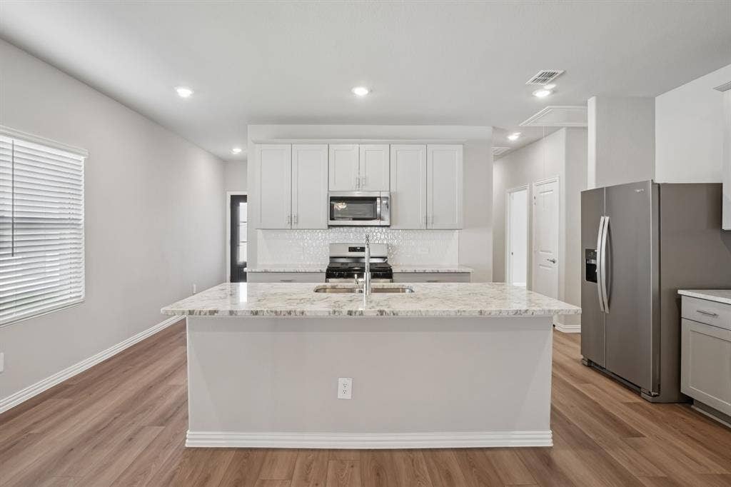 209 Decoursey Drive, Princeton, TX 75071 Photo is not of the actual home, but is an inspirational photo of builder’s model home and may depict options, furnishings, and/or decorator features that are not included.
