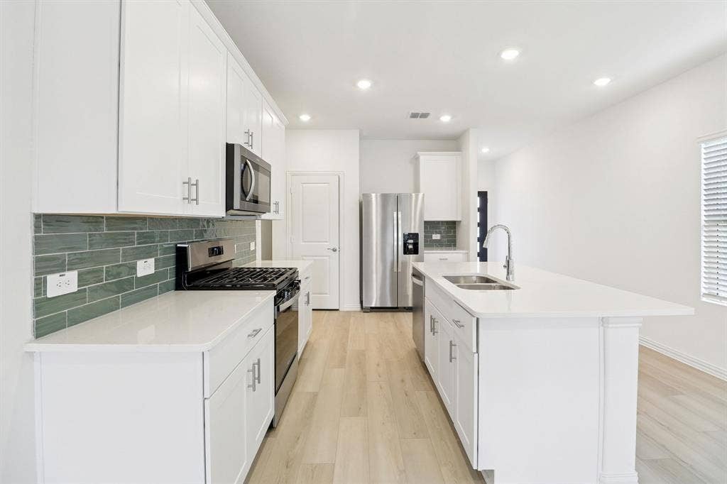207 Decoursey Drive, Princeton, TX 75071 Photo is not of the actual home, but is an inspirational photo of builder’s model home and may depict options, furnishings, and/or decorator features that are not included.