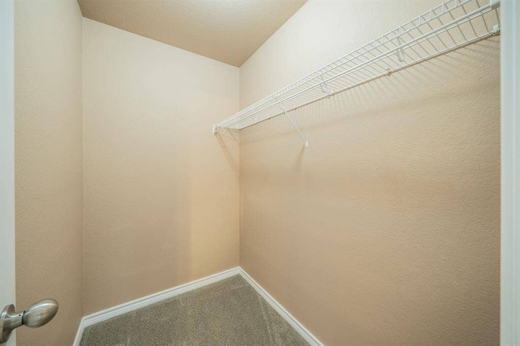 1739 Chadwick Drive, Cedar Hill, TX 75104 Upstairs bedroom walk-in closet. All upstairs bedrooms have walk-in closets.