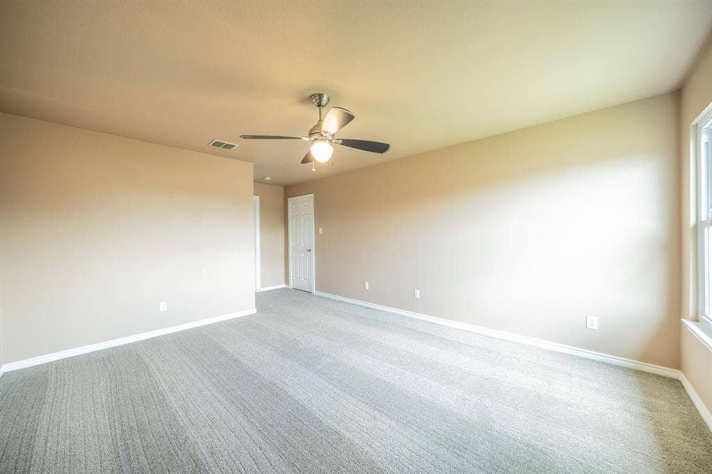 1739 Chadwick Drive, Cedar Hill, TX 75104 Second upstairs bedroom with ceiling fans.