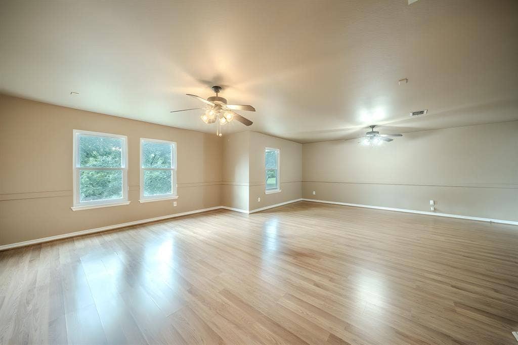 1739 Chadwick Drive, Cedar Hill, TX 75104 This large second floor living area has kind of a natural divide in the middle. This could be a game room and a media room or one large living area.