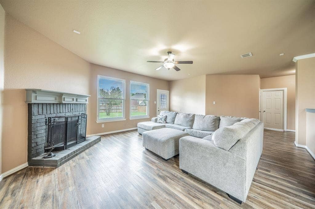 1739 Chadwick Drive, Cedar Hill, TX 75104 Family room with fireplace, mantle, hearth, fireplace tools and screen.