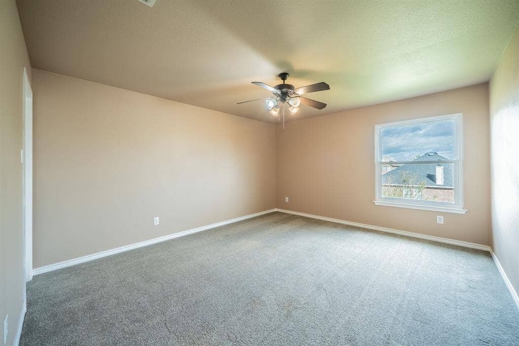 1739 Chadwick Drive, Cedar Hill, TX 75104 Third upstairs bedroom with ceiling fan.