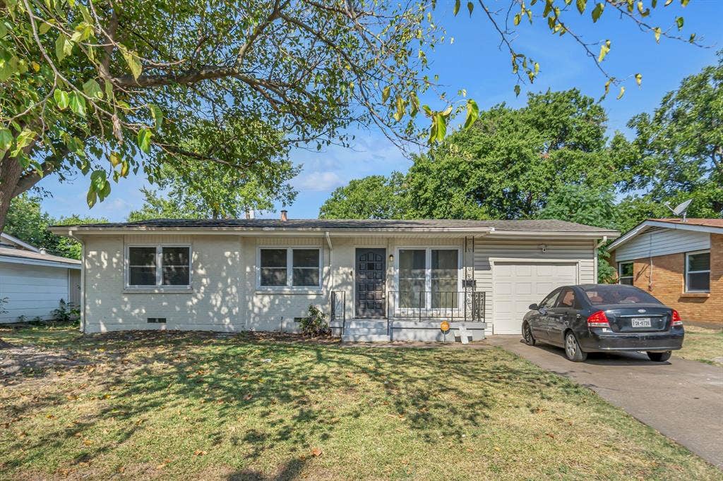 9621 Rustown Drive, Dallas, TX 75228 Single-story residence featuring light-colored exterior siding, a front entry with security door, and an attached single-car garage