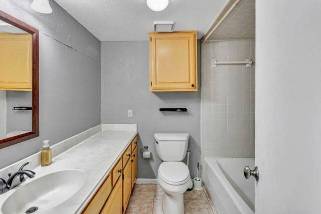 2503 Shady Ridge Drive, Bedford, TX 76021 Bathroom featuring an extended countertop vanity, light-finish cabinetry, wall-mounted upper storage cabinet, and a tiled tub-shower combination