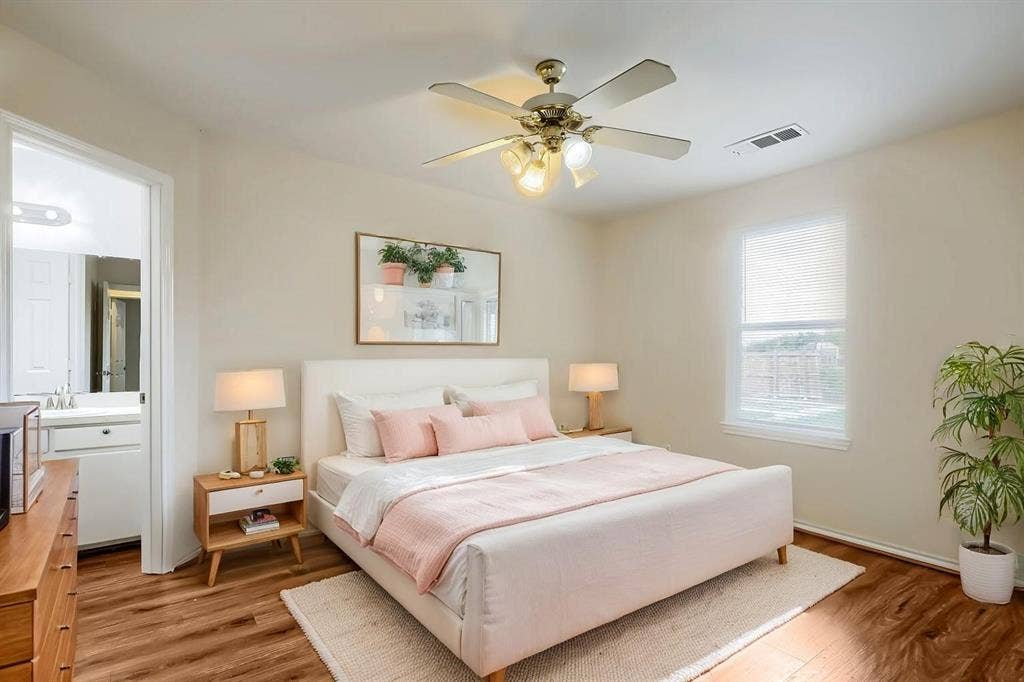 112 Sebastian Lane, Josephine, TX 75173 Virtually Staged. Laminate Wood-finish flooring, ceiling fan with integrated lighting, neutral wall palette, and dual-pane window