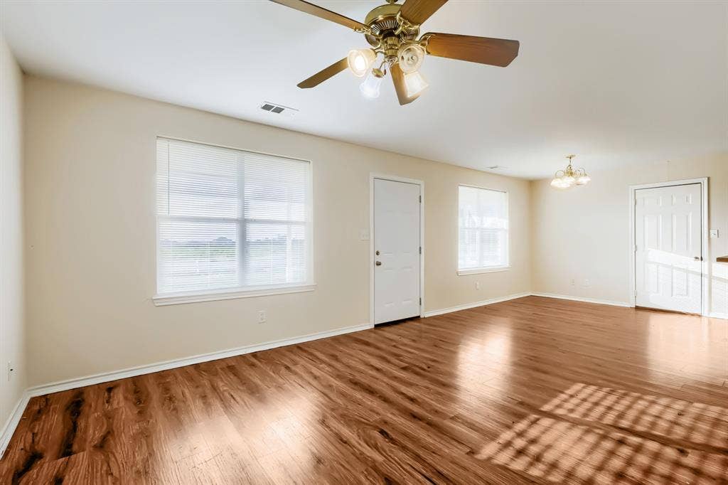 112 Sebastian Lane, Josephine, TX 75173 Large rooms featuring laminate wood flooring