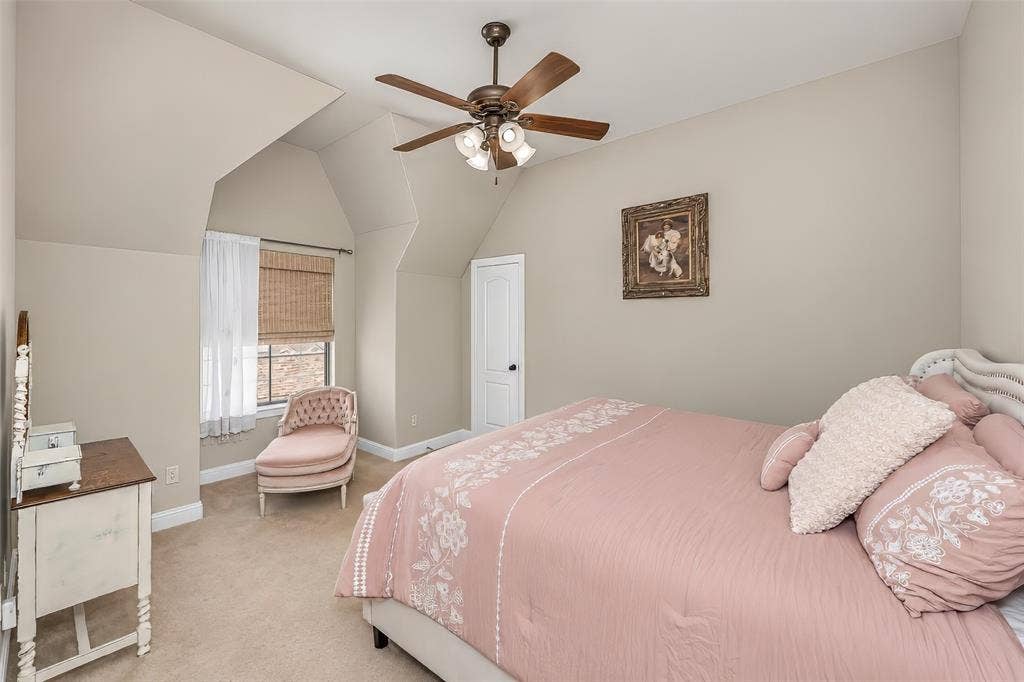 6620 Cedar Grove Drive, North Richland Hills, TX 76182 Upstairs bedroom 4 features charming ceiling and window detail.