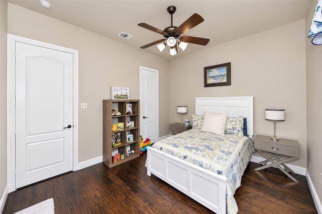 6620 Cedar Grove Drive, North Richland Hills, TX 76182 Also featured in the downstairs guest bedroom is a walk in closet.