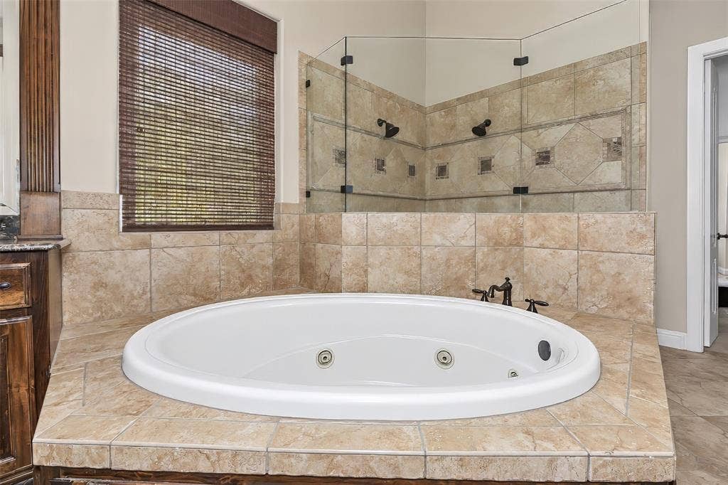 6620 Cedar Grove Drive, North Richland Hills, TX 76182 Indulge in the luxury of a jetted tub.