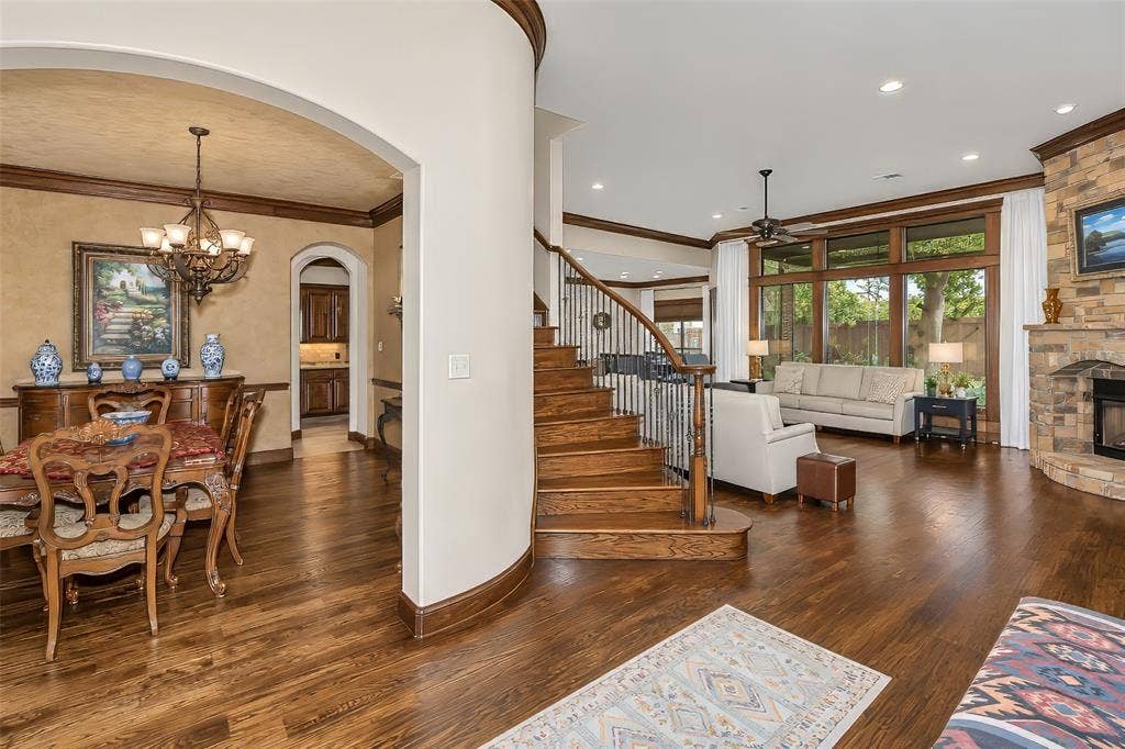 6620 Cedar Grove Drive, North Richland Hills, TX 76182 Formal dining and grand staircase just off foyer.