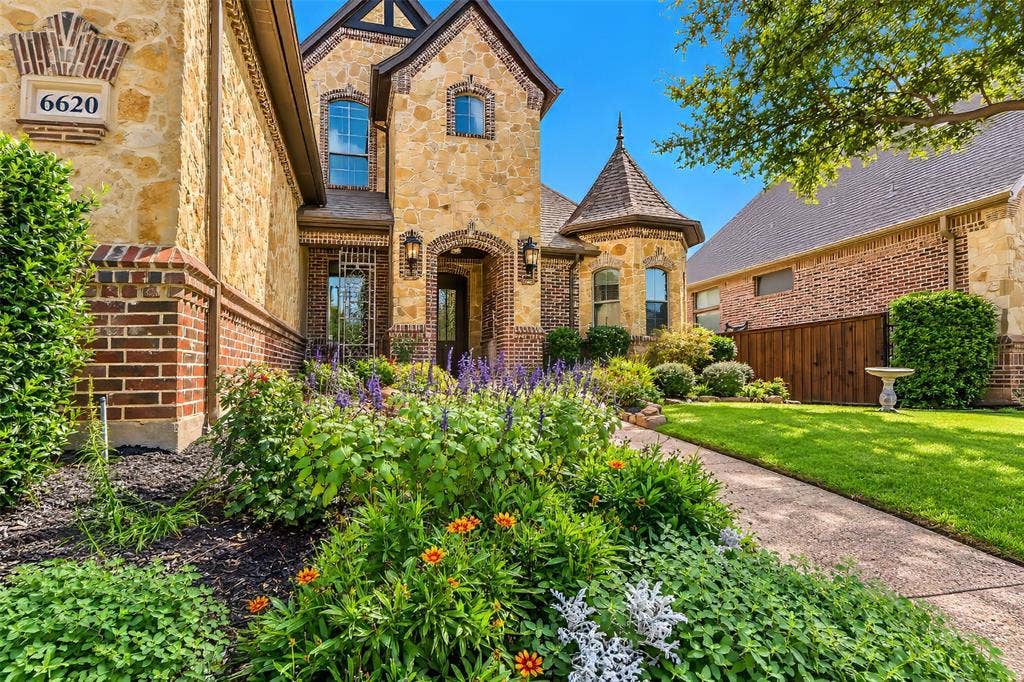 6620 Cedar Grove Drive, North Richland Hills, TX 76182 Perennials greet the visitor.
