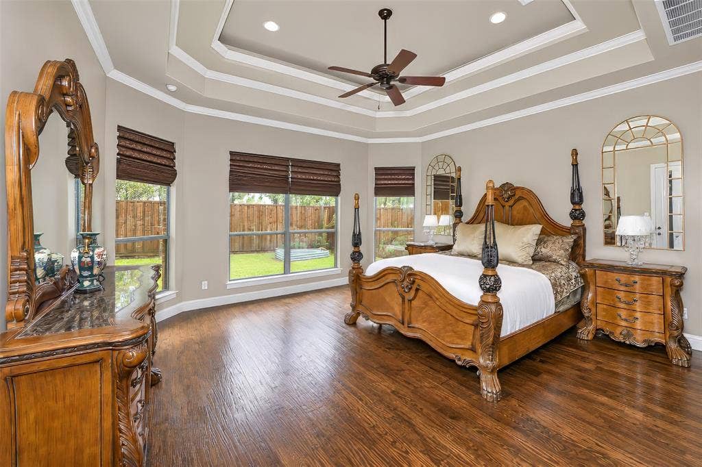 6620 Cedar Grove Drive, North Richland Hills, TX 76182 Also featured is a wall of windows overlooking the landscaped back yard.
