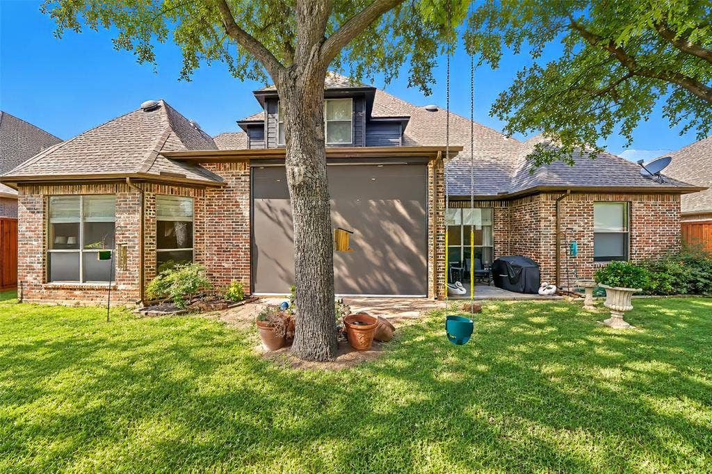 6620 Cedar Grove Drive, North Richland Hills, TX 76182 The back yard is graced by an impressive old growth tree.