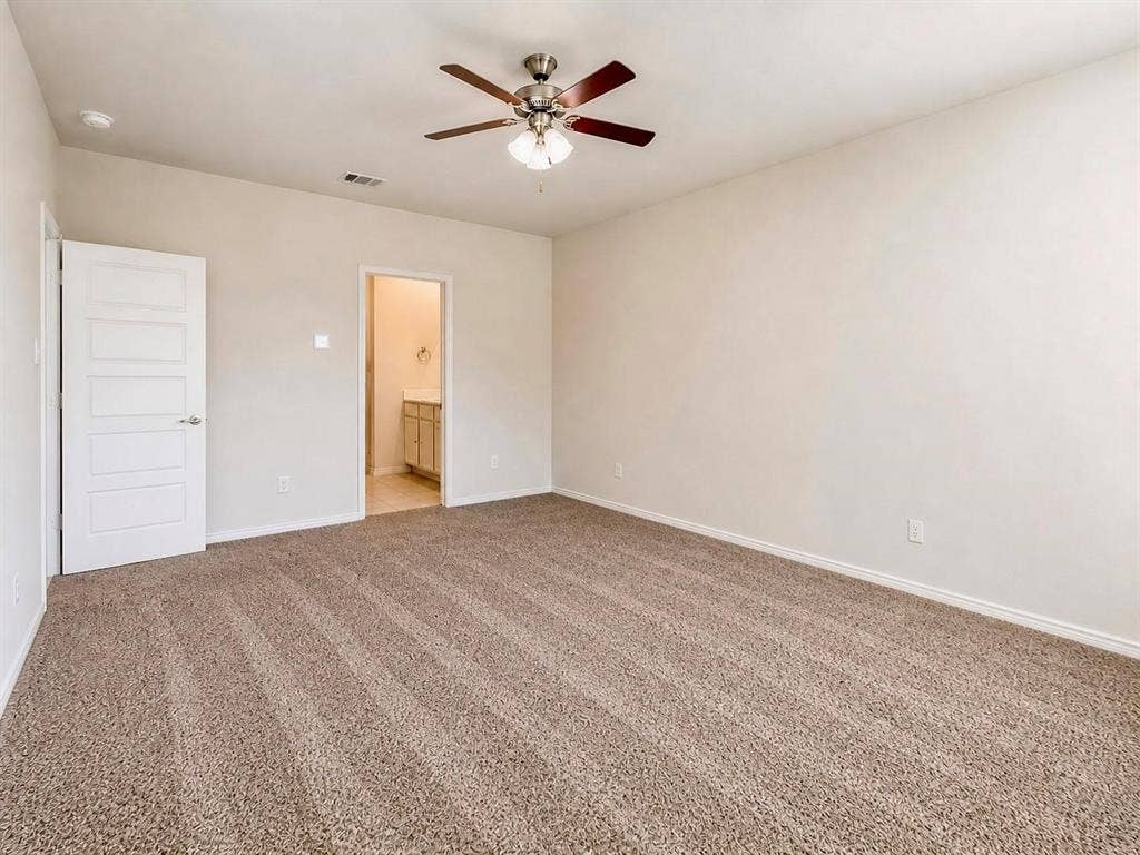 Primary bedroom features ensuite bathroom