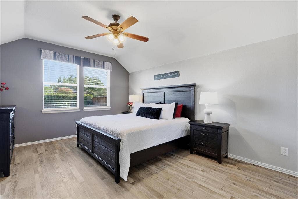 A secluded downstairs location & adjoining updated bath make the primary suite a comfortable retreat.