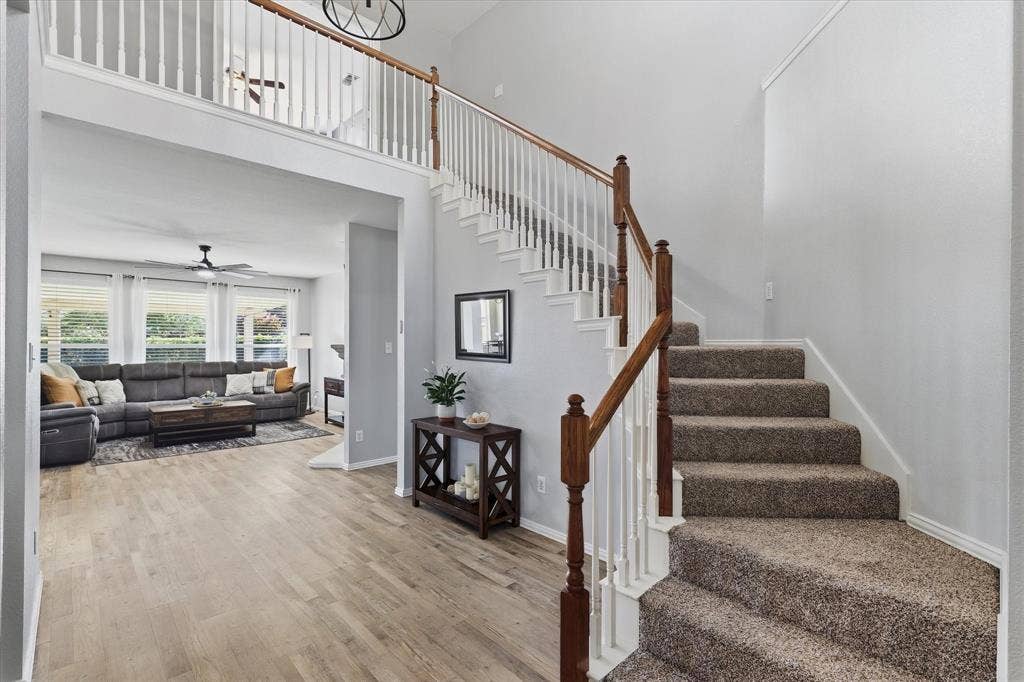 Inside, a two-story foyer, neutral color palette & luxury vinyl plank flooring throughout the first floor create a cohesive and welcoming feel.
