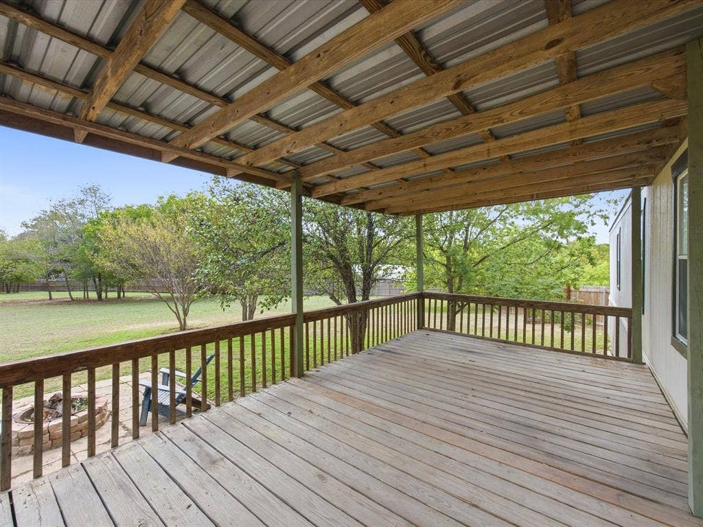 4113 Goliad Drive, Granbury, TX 76048 10x20 covered deck overlooking the awesome backyard