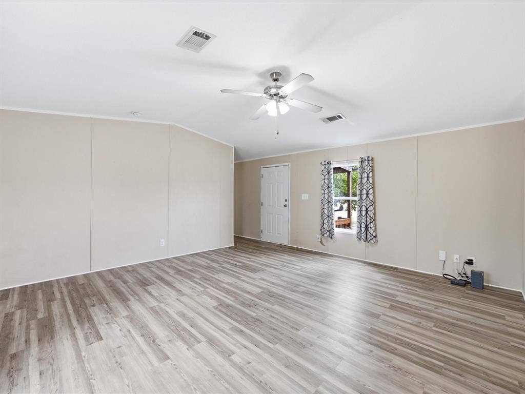 4113 Goliad Drive, Granbury, TX 76048 Spacious open floor plan with vaulted ceilings and ceiling.