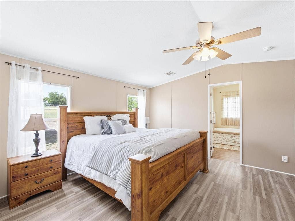 4113 Goliad Drive, Granbury, TX 76048 Spacious primary bedroom with ensuite bath.