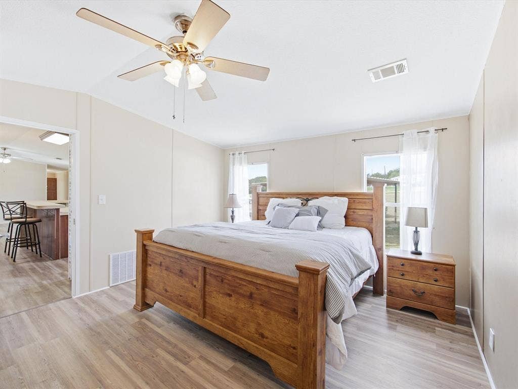 4113 Goliad Drive, Granbury, TX 76048 Spacious primary bedroom with ensuite bath.