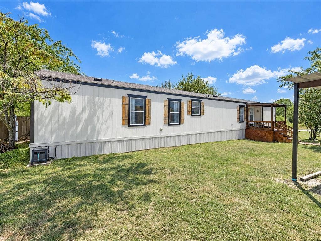 4113 Goliad Drive, Granbury, TX 76048 Nice hardie siding, covered front porch, tons of parking. Nice shade trees.