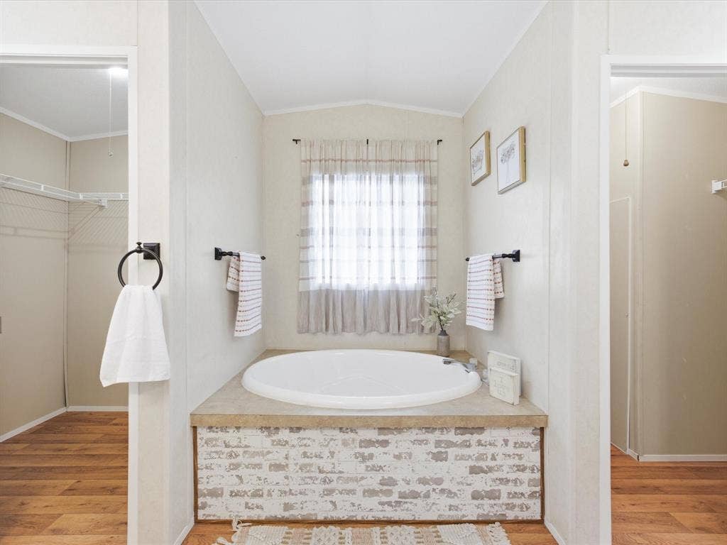 4113 Goliad Drive, Granbury, TX 76048 Garden tub to soak your stress away!