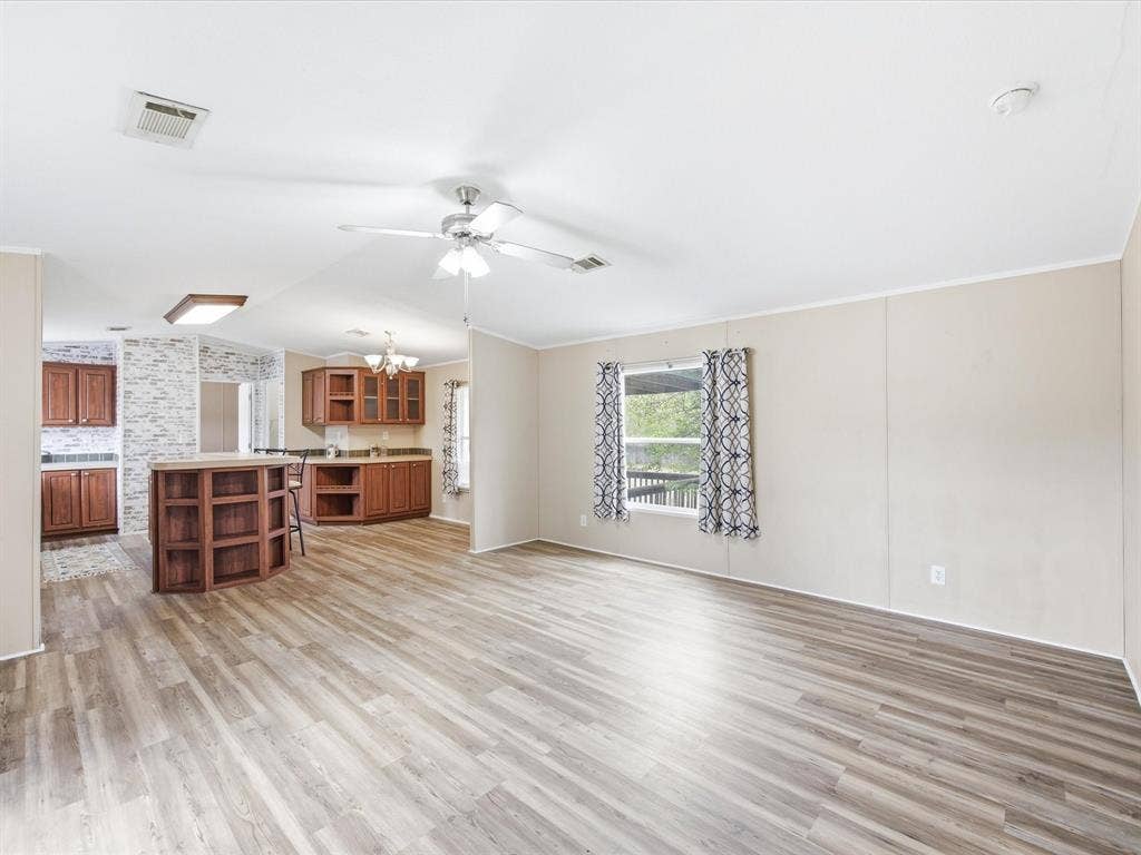4113 Goliad Drive, Granbury, TX 76048 Open concept living and kitchen space.