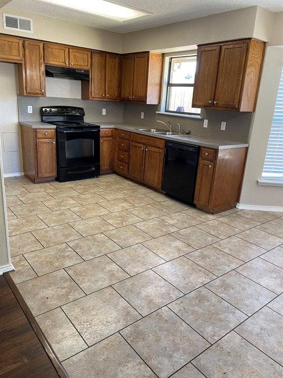2414 PALO ALTO, Arlington, TX 76015 A great view of the large backyard is enjoyed from the kitchen.