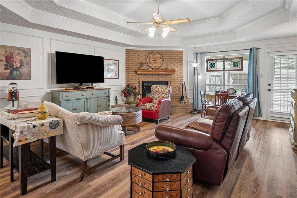 8920 Ashcraft Drive, North Richland Hills, TX 76182 Great natural light and a gorgeous wood burning fireplace.