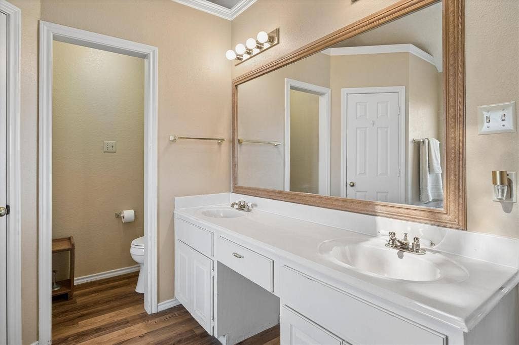 8920 Ashcraft Drive, North Richland Hills, TX 76182 Spacious vanity with dual sinks.