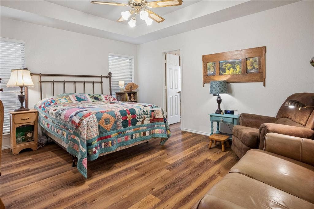 8920 Ashcraft Drive, North Richland Hills, TX 76182 Spacious primary bedroom with room for additional seating.