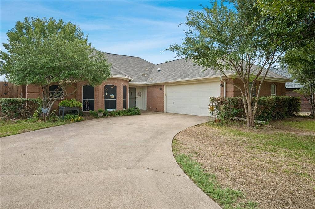 8920 Ashcraft Drive, North Richland Hills, TX 76182 Gorgeous curb appeal with a spacious driveway.