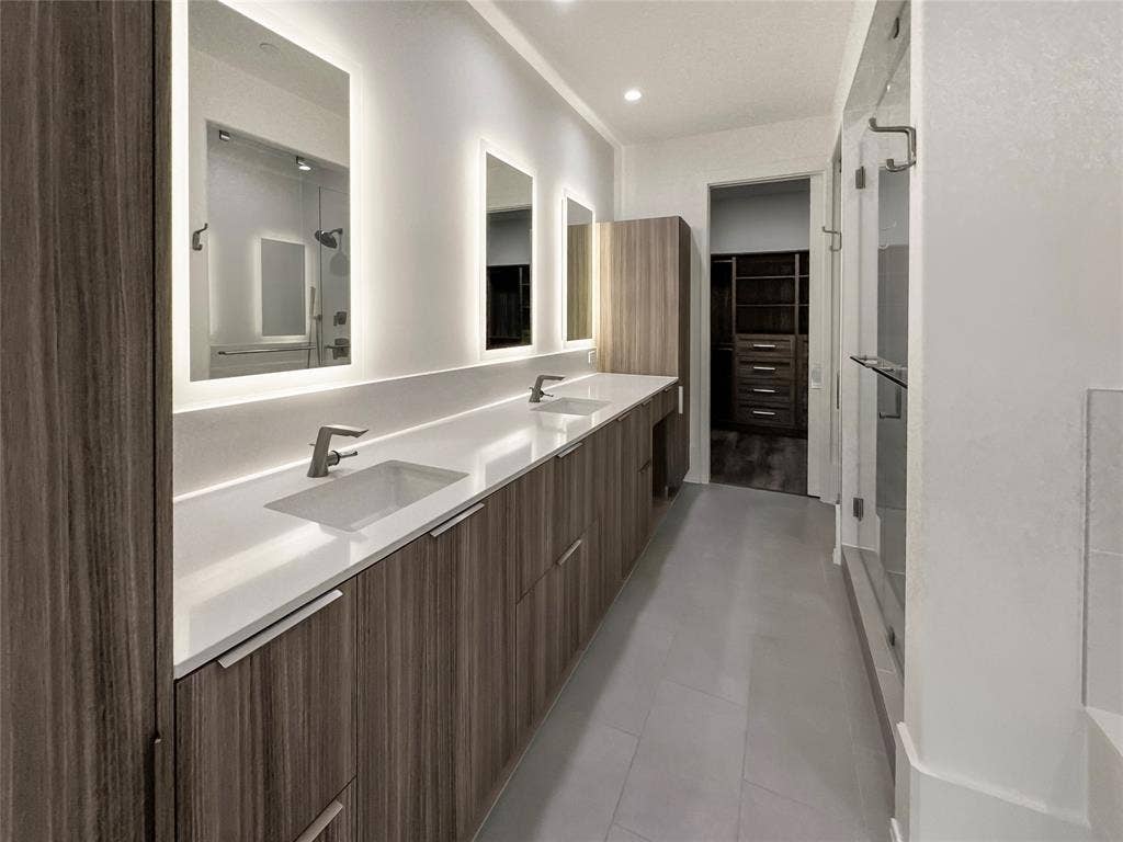 Bathroom featuring vanity and tile patterned flooring