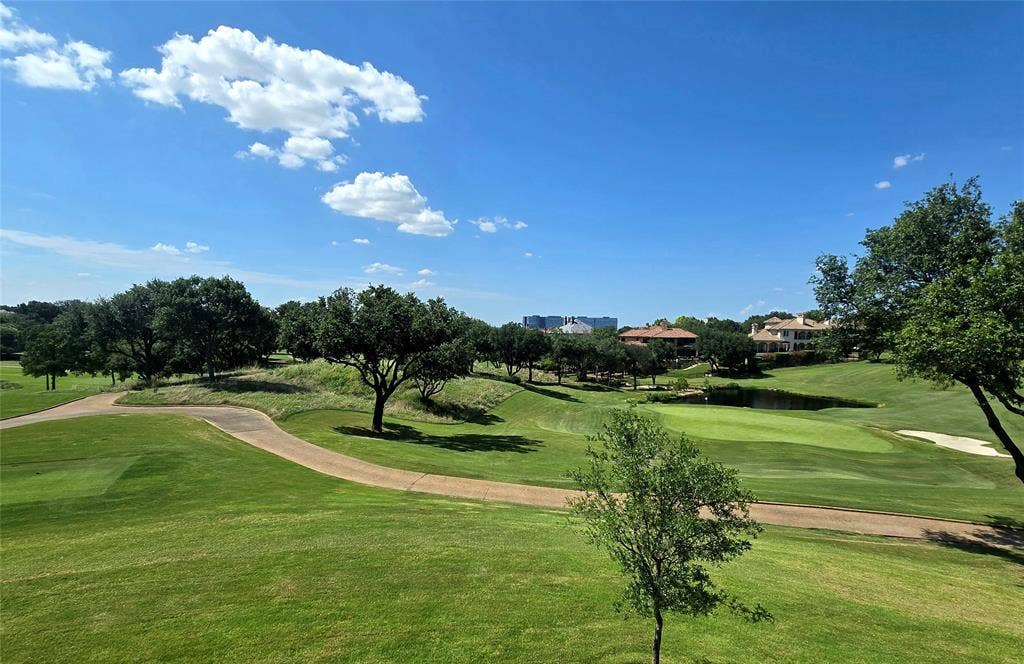 320 N O Connor Ridge Boulevard, #21, Irving, TX 75038 Front-row seat to the areas most coveted resort-style setting!