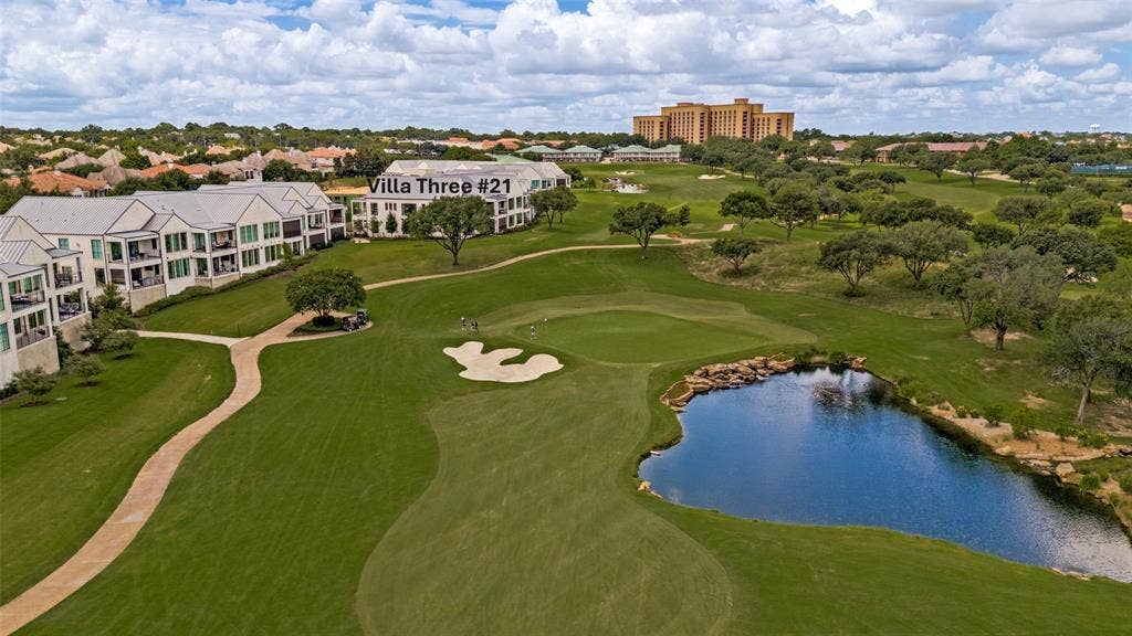 320 N O Connor Ridge Boulevard, #21, Irving, TX 75038 Villa Three #21-Upper Corner location with spectacular views of the 17 and 18th fairway and water feature!