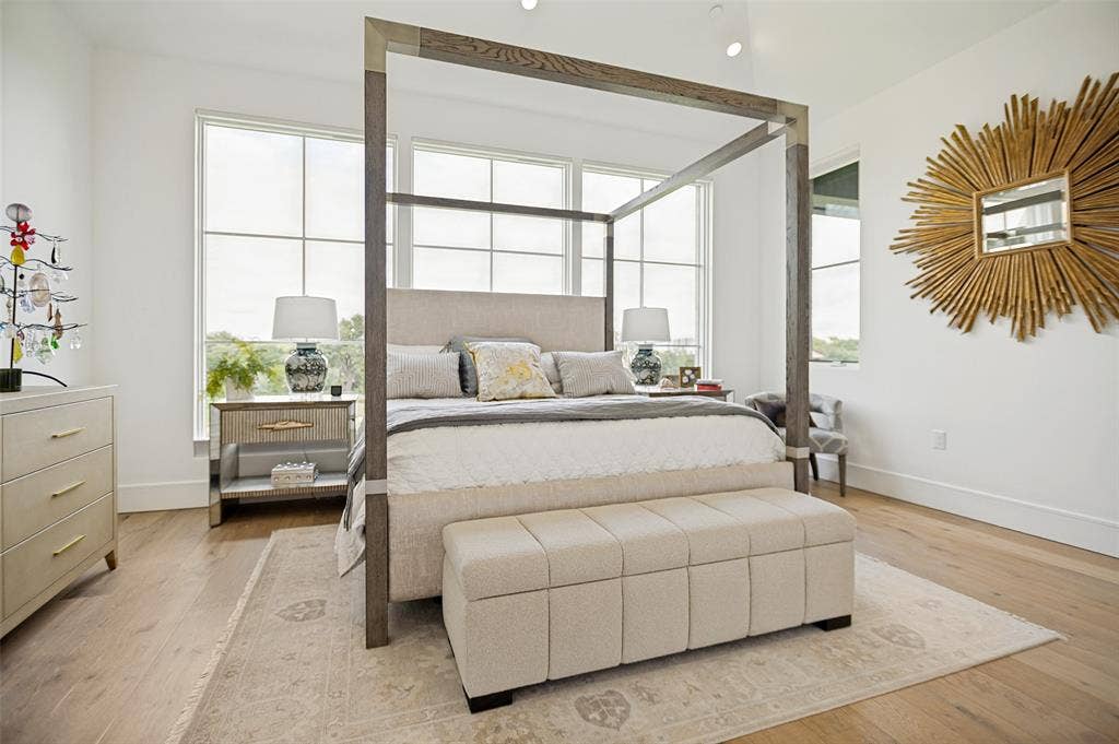 320 N O Connor Ridge Boulevard, #21, Irving, TX 75038 Primary suite with expansive windows overlooking the 17th fairway