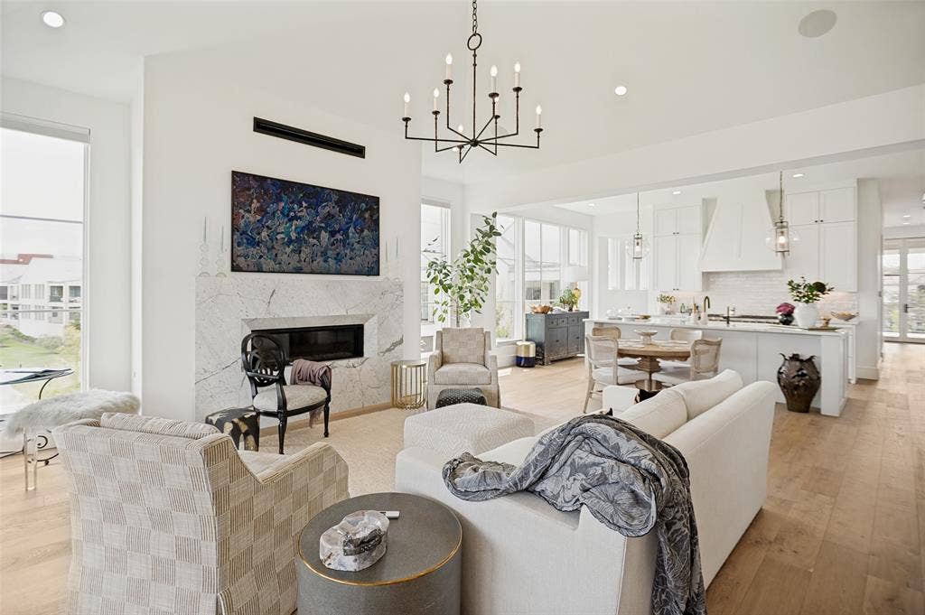 320 N O Connor Ridge Boulevard, #21, Irving, TX 75038 A striking marble fireplace serves as the centerpiece of the great room