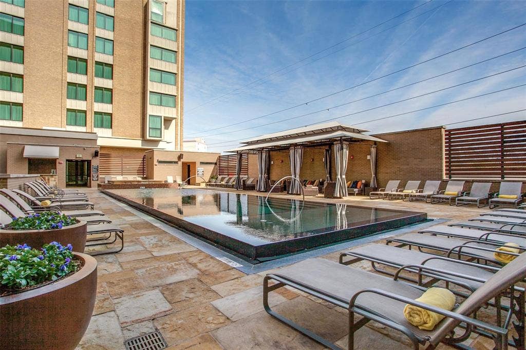 5656 N CENTRAL Expressway, #702, Dallas, TX 75206 Stunning pool great for swimming laps or just lounging - and with food/beverage service from the adjacent Hilton Highland Hotel from Memorial Day through Labor Day.