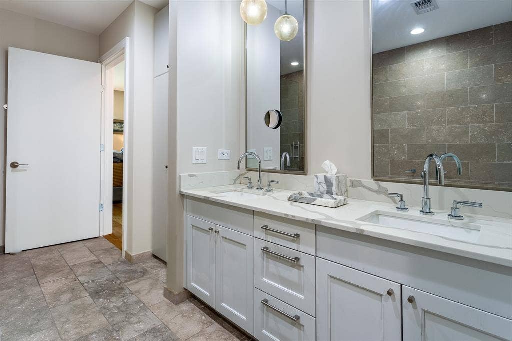 5656 N CENTRAL Expressway, #702, Dallas, TX 75206 Double vanity with quartz counters & Dornbracht fixtures.