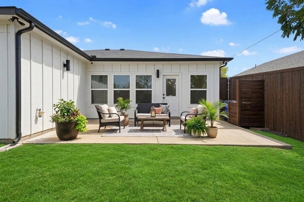 3001 Fernwood Avenue, Dallas, TX 75216 Patio staged and grass digitally enhanced