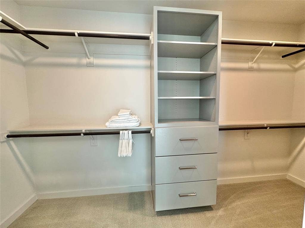 6911 Cowboys Way, #913, Frisco, TX 75034 Spacious closet featuring light carpet