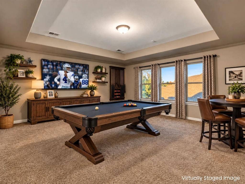 3014 Aurora Mist Drive, Little Elm, TX 75068 Virtually staged to show this as a true game room. The stair well is 40-inches wide so it would be easy to get a pool table up here.