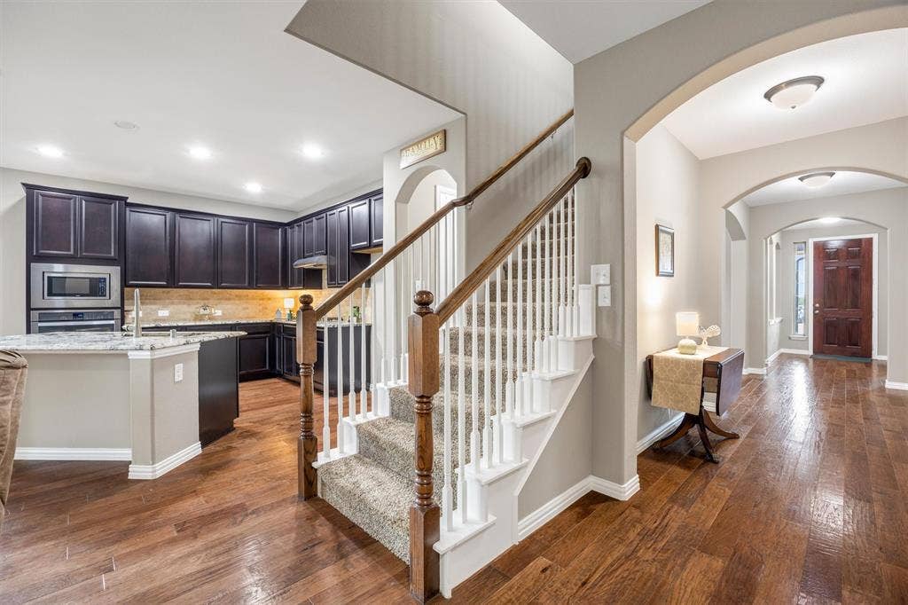 3014 Aurora Mist Drive, Little Elm, TX 75068 The foyer is 32-ft long and is meant to hold large furniture pieces.